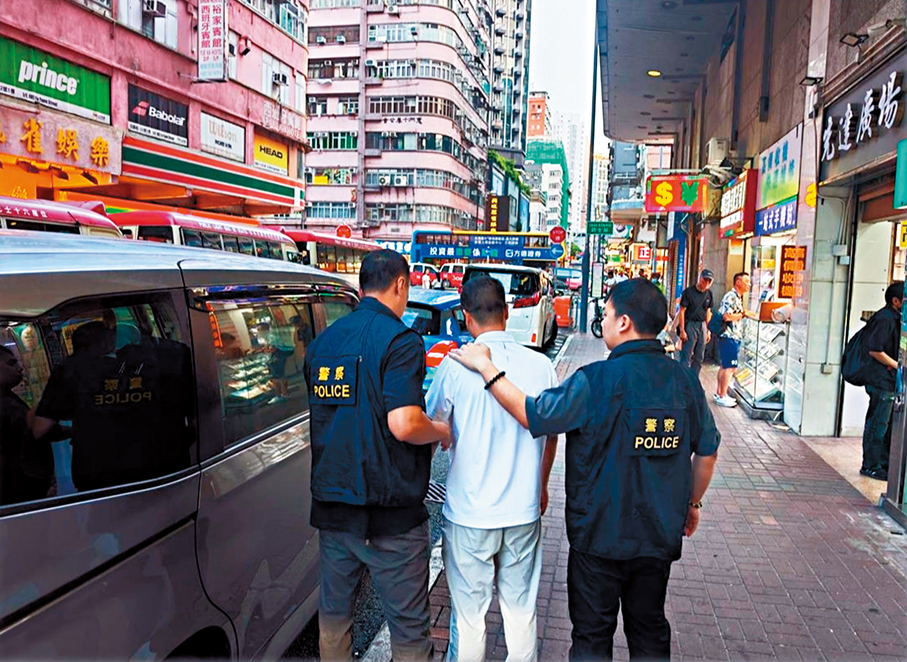 ●警方在旺角拘捕其中一名涉案男子。 警方圖片