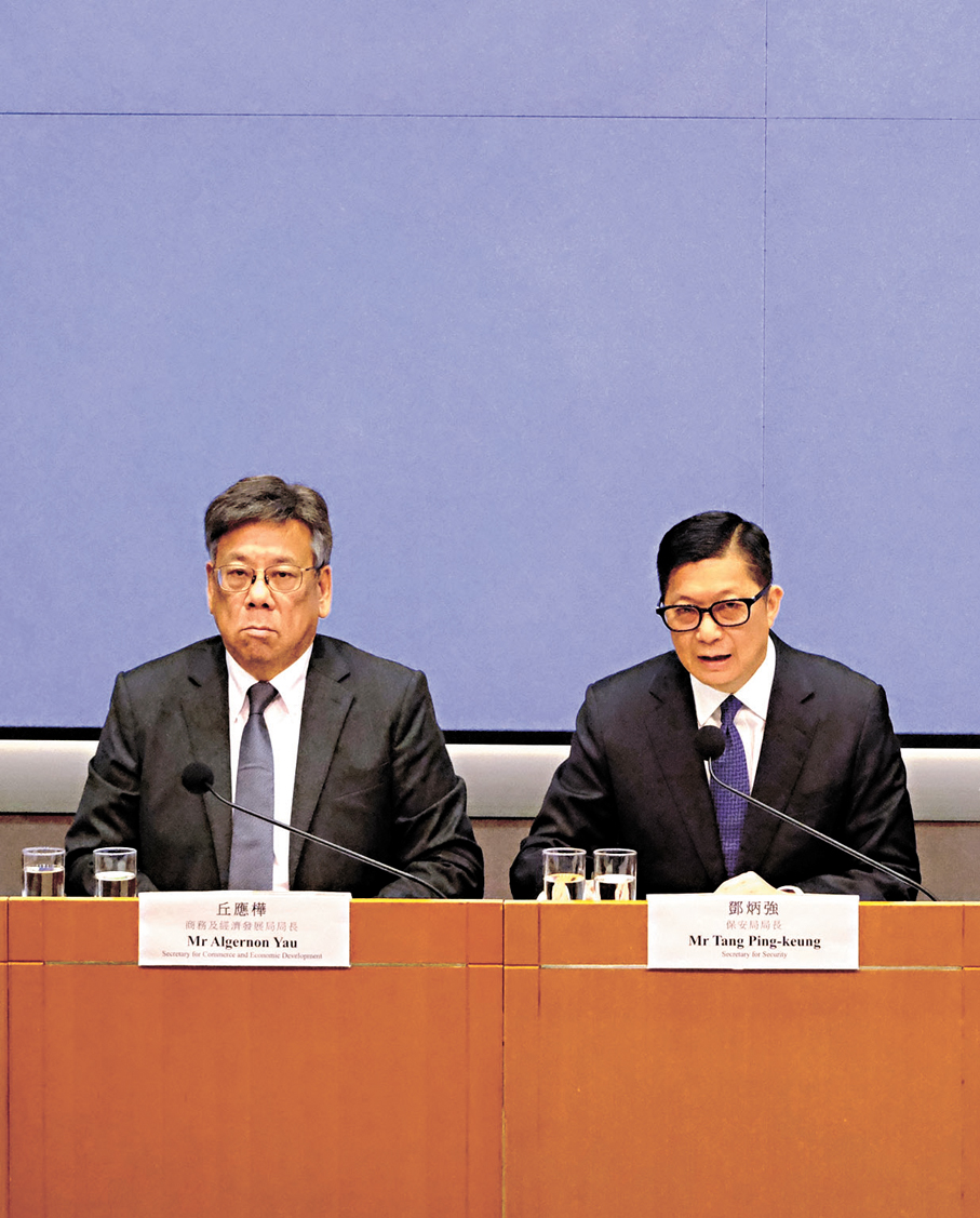 ●右起：鄧炳強、丘應樺。香港文匯報記者涂穴  攝